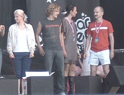 BWO members with another performer on stage